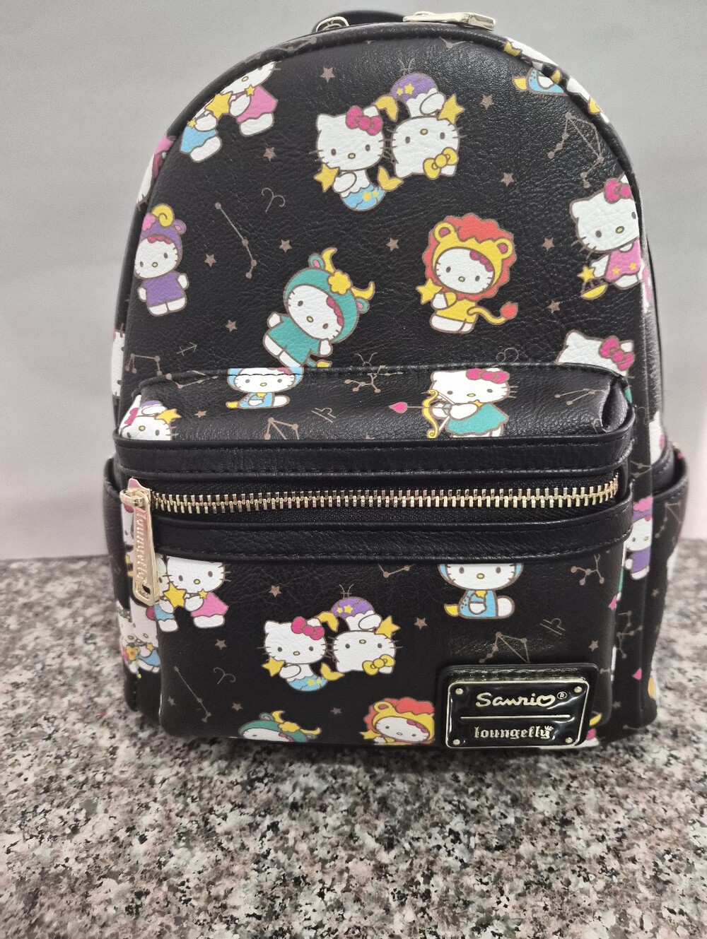 Loungefly Hello Kitty All Over Print Mini Backpack.
